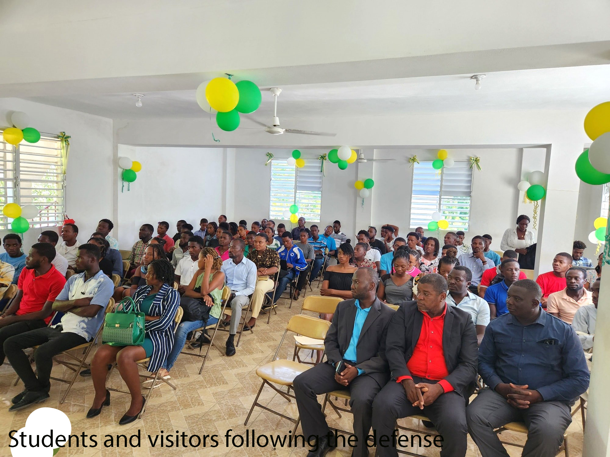 Students and visitors following the defense